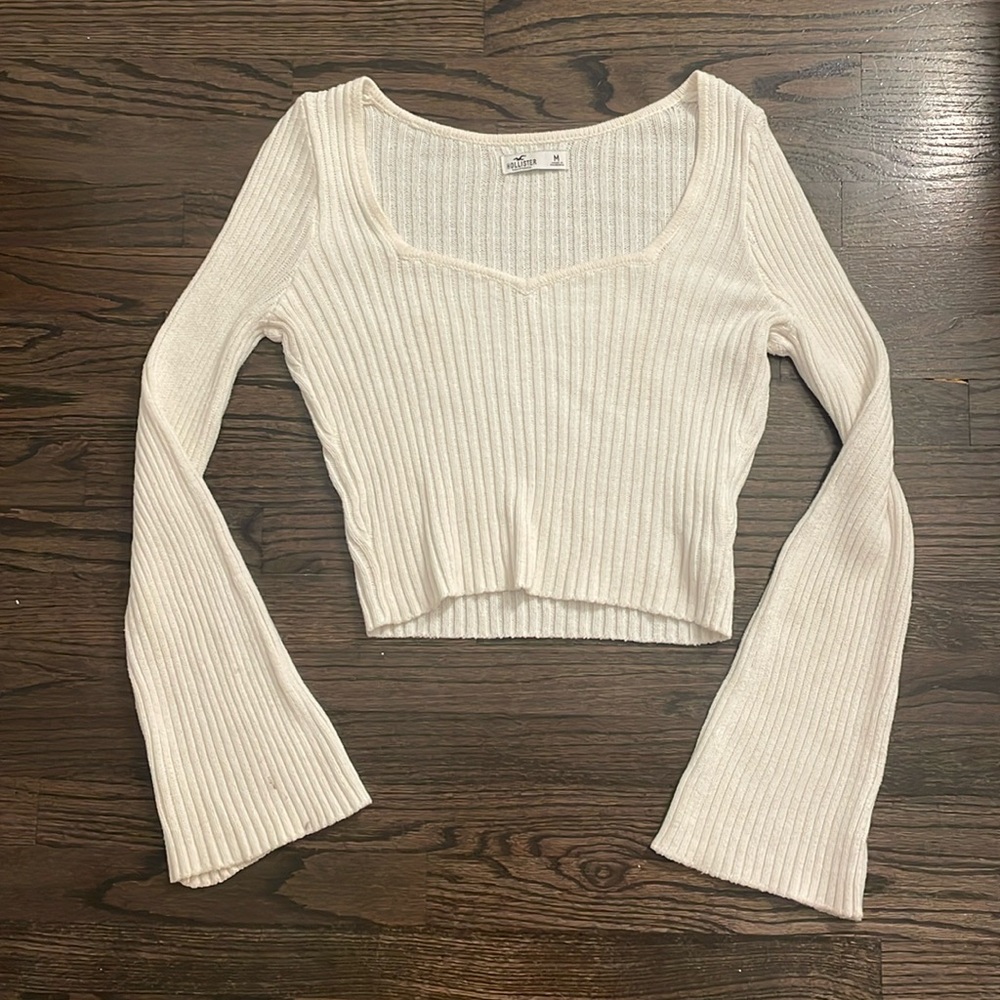 White flared sleeve sweater